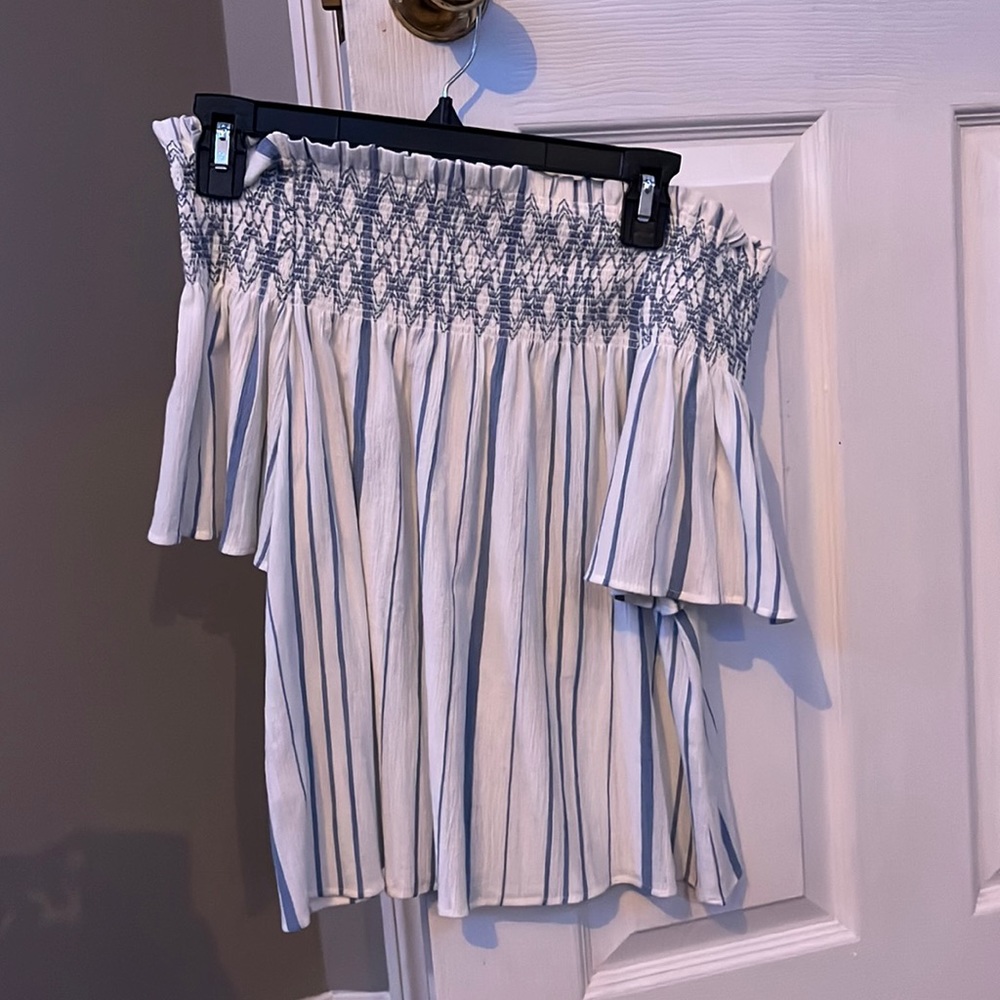 Stretchy top. Off the shoulder white and blue shirt.
